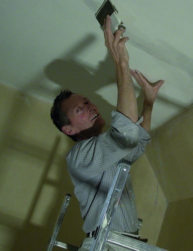 © Adriana Sjan Bijman,FF, 2000 Neils Paulsen, doing the painting/decorating of the guest-room, Dec 2000